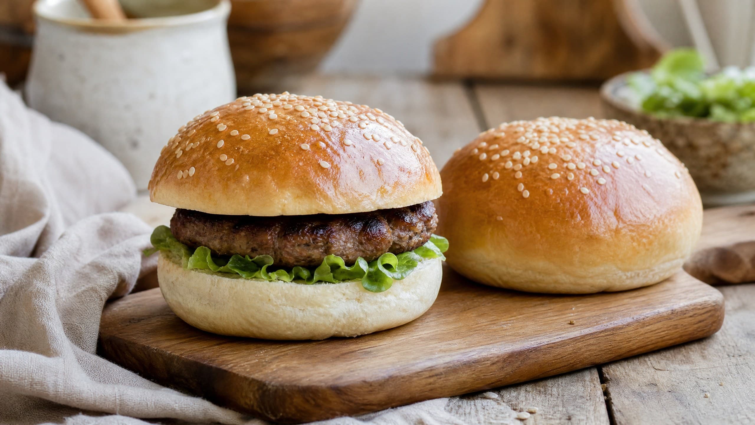Warm sourdough discard hamburger buns made with sourdough discard